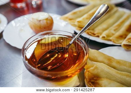 Pancakes With Cheese Are Served With Honey
