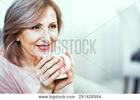 A Close Up Portrait Of A Woman Of European Appearance. In Appearance Woman Are Over 50 Years Old. Th