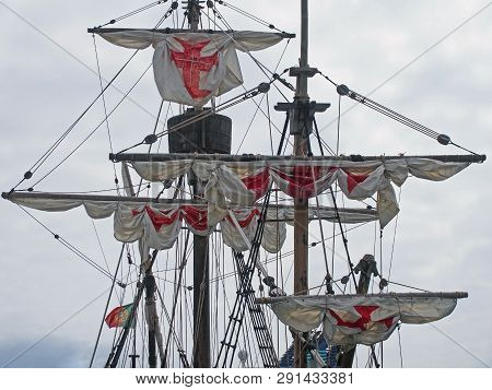 The Masts Sails And Rigging Of The Santa Maria A Historic Sailing Ship In Funchal Harbour With White