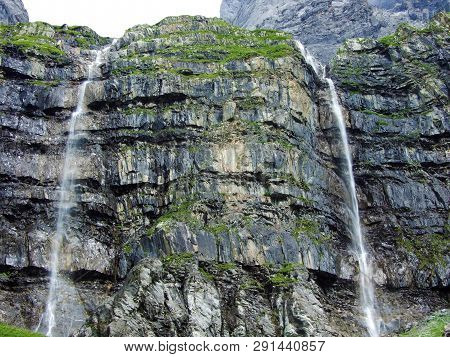 Nameless Waterfalls Under The Alpine Peaks Glarner Vorab And Bünder Vorab In The Valley Of Im Loch -