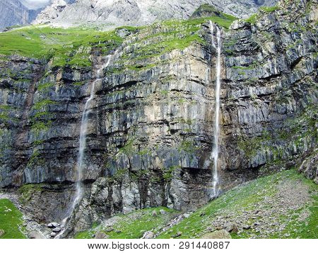 Nameless Waterfalls Under The Alpine Peaks Glarner Vorab And Bünder Vorab In The Valley Of Im Loch -