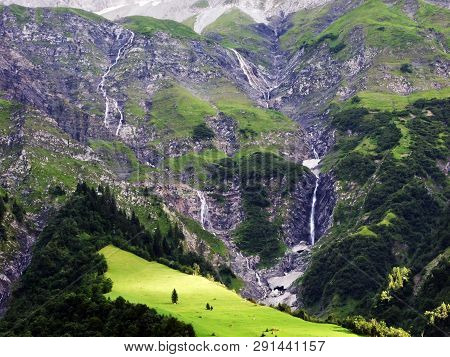 Nameless Waterfalls Under The Alpine Peaks Glarner Vorab And Bünder Vorab In The Valley Of Im Loch -