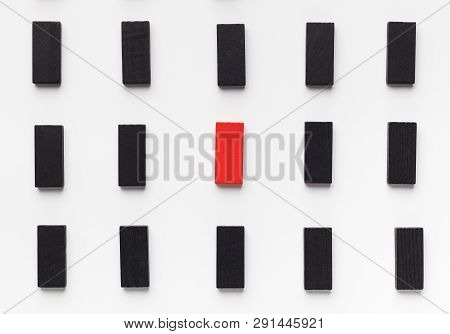 Ageism. Age Discrimination Shown With One Red Wooden Block Between Black Ones, Top View