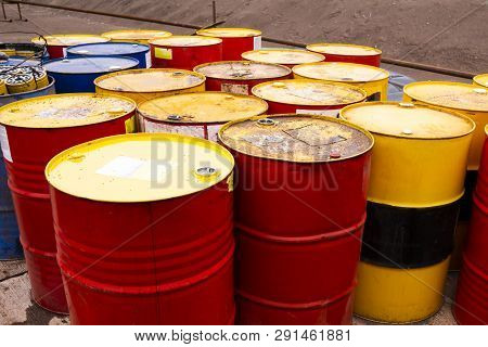 Colored Metal Barrels. Blue Oil Drums Containing Fuel For Transportation