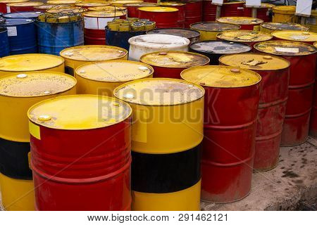 Colored Metal Barrels. Blue Oil Drums Containing Fuel For Transportation