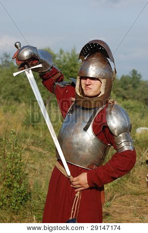 KIEV, UKRAINE - JULY 31: Member of history club Golden Capricorn wears medieval costume as he participates in historical festival and camp in memory of King Vladimir July 31, 2009 in Kiev, Ukraine.