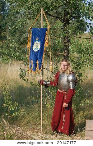 KIEV, UKRAINE - JULY 31: Member of history club Golden Capricorn wears medieval costume as he participates in historical festival and camp in memory of King Vladimir July 31, 2009 in Kiev, Ukraine.