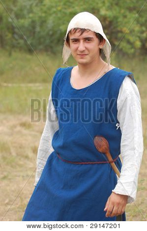 KIEV, UKRAINE - JULY 31: Member of history club Golden Capricorn wears medieval costume as he participates in historical festival and camp in memory of King Vladimir July 31, 2009 in Kiev, Ukraine.