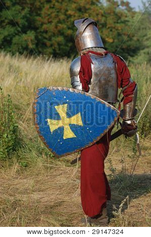KIEV, UKRAINE - JULY 31: Member of history club Golden Capricorn wears medieval costume as he participates in historical festival and camp in memory of King Vladimir July 31, 2009 in Kiev, Ukraine.