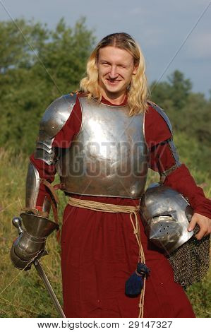 KIEV, UKRAINE - JULY 31: Member of history club Golden Capricorn wears medieval costume as he participates in historical festival and camp in memory of King Vladimir July 31, 2009 in Kiev, Ukraine.