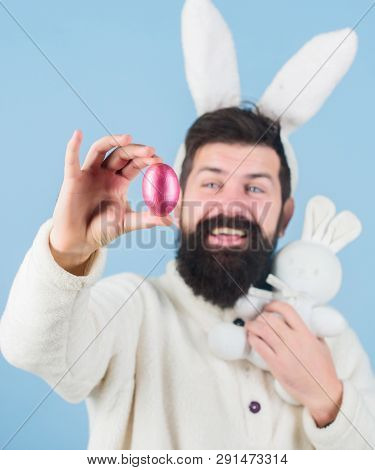 Easter Symbol Concept. My Precious. Bearded Man Wear Silly Bunny Ears. Hipster Cute Bunny Long Ears 
