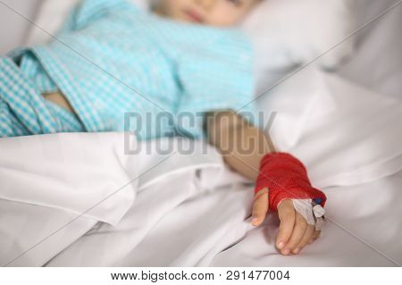 Details With A Cannula On The Hand Of A Ill Little Girl In A Pediatric Hospital Reserve
