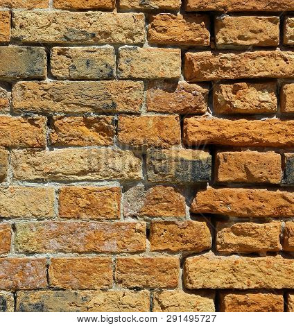 Background Of Many Red Bricks Wall In Vertical