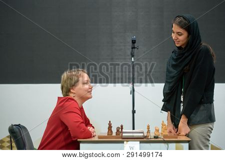 ST. PETERSBURG, RUSSIA - DECEMBER 30, 2018: Match Valentina Gunina, Russia (left) vs Sarasadat Khademalsharieh, Iran during King Salman World Blitz Chess Championship 2018. The match ended with a draw