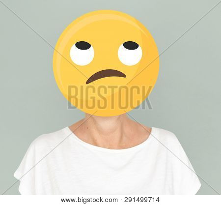 Unamused face emoji portrait on a woman