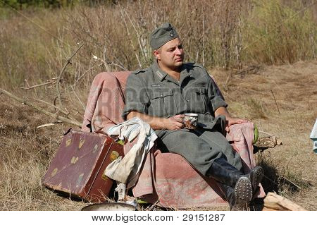 KIEV, UKRAINE - SEPT 19, : Member of a history club wear historical German uniforms as he participates in a WWII reenactment.Buttle for Kiev in 1943. September 19 , 2009 in Kiev, Ukraine