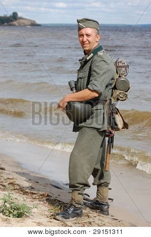 KIEV, UKRAINE - SEPT 19, : Member of a history club wear historical German uniforms as he participates in a WWII reenactment.Buttle for Kiev in 1943. September 19 , 2009 in Kiev, Ukraine