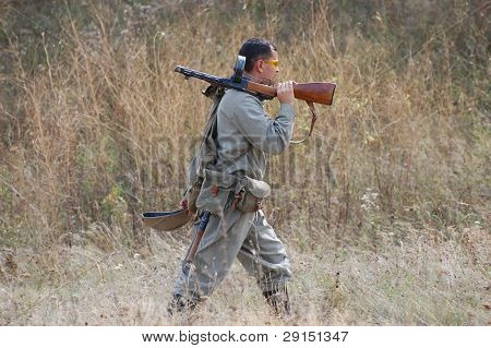 KIEV, UKRAINE - SEPT 19, : Member of a history club wear historical Soviet  uniforms as he participates in a WWII reenactment.Buttle for Kiev in 1943. September 19 , 2009 in Kiev, Ukraine