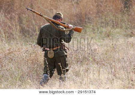 KIEV, UKRAINE - SEPT 19, : Member of a history club wear historical Soviet  uniforms as he participates in a WWII reenactment.Buttle for Kiev in 1943. September 19 , 2009 in Kiev, Ukraine