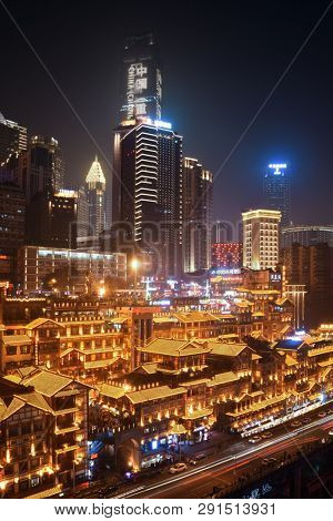 CHONGQING, CHINA â MARCH 13: Hongyadong shopping complex at night on March 13, 2018 in Chongqing. With 17M population, it is the most populous Chinese municipality.