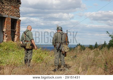 KIEV, UKRAINE - SEPT 19, : Members of a history club wear historical German uniforms as they participates in a WWII reenactment.Buttle for Kiev in 1943. September 19 , 2009 in Kiev, Ukraine