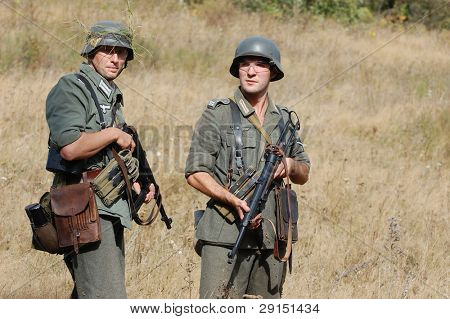 KIEV, UKRAINE - SEPT 19, : Members of a history club wear historical German uniforms as they participates in a WWII reenactment.Buttle for Kiev in 1943. September 19 , 2009 in Kiev, Ukraine