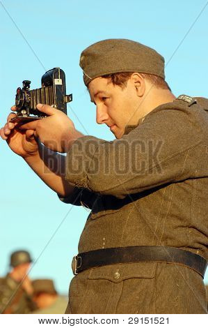 KIEV, UKRAINE - SEPT 19, : Member of a history club wear historical German uniforms as he participates in a WWII reenactment.Buttle for Kiev in 1943. September 19 , 2009 in Kiev, Ukraine