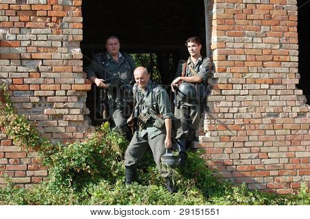 KIEV, UKRAINE - SEPT 19, : Members of a history club wear historical German uniforms as they participates in a WWII reenactment.Buttle for Kiev in 1943. September 19 , 2009 in Kiev, Ukraine