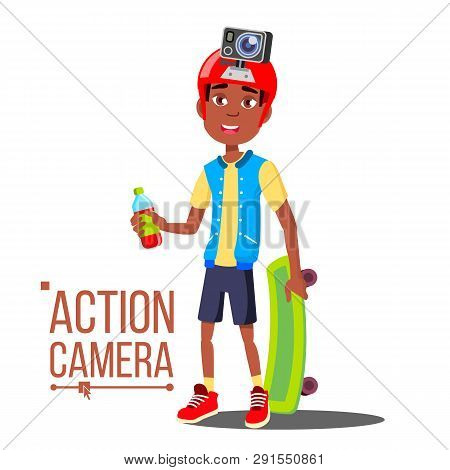 Child Boy With Action Camera . Afro American Teenager. Red Helmet. Shooting Process. Active Type Of 