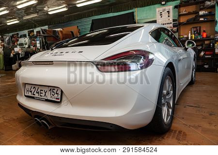 Novosibirsk, Russia - 08.01.18: Rear View Of Luxury Very Expensive New White Porsche Cayman Coupe Sp