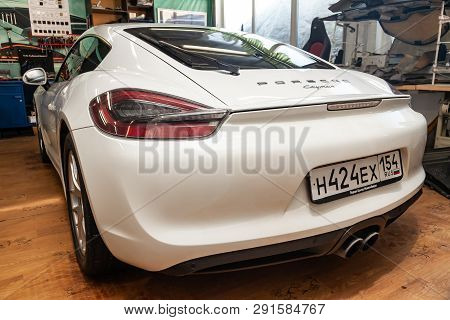 Novosibirsk, Russia - 08.01.18: Rear View Of Luxury Very Expensive New White Porsche Cayman Coupe Sp