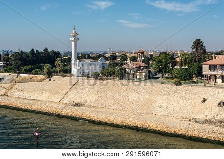 Ismailia, Egypt - November 5, 2017: El Shefaa Mosque And Ajat Church On The Shore Of Suez Canal In I