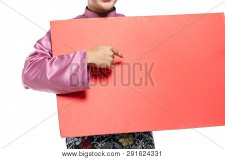 Portrait Of Young And Handsome Asian Man With Traditional Clothing Holding Red Cardboard