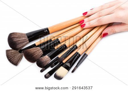 Various Makeup Brushes Isolated Over White. Wooden Makeup Brushes. Duo Fibre Foundation Makeup Brush