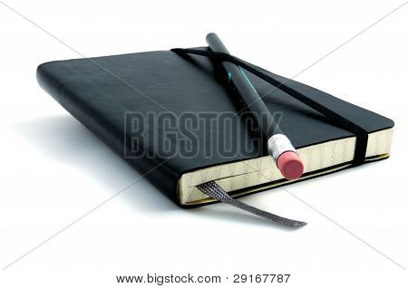 Pencil On Top Of Notebook
