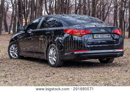 Krivoy Rog, Ukraine - March 2, 2019: Photo Of Black Kia Optima K5 In The Park.