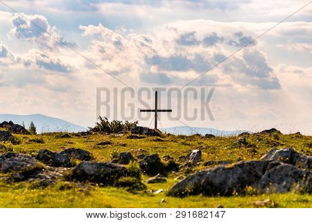 Cross On A Peak Of Austrian Mountain Schockl In Styria Graz. Place For Tourism And Hiking Recreation