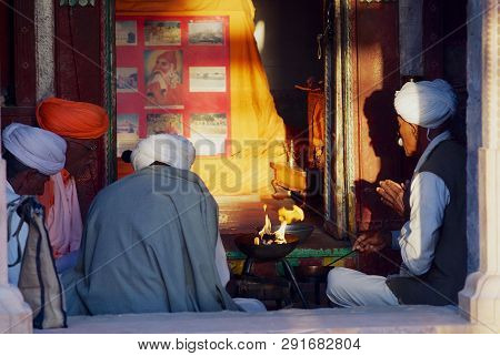 Jamba, India - April 02, 2007: Unidentified Men Perform Morning Religious Ceremony In The Local Comm
