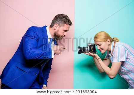 Ensuring That His Gesture Is Sharp And Focussed. Businessman Posing For Female Photographer. Fashion