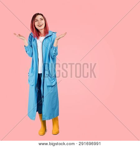Pretty Girl Smiles Widely And Spreads Her Hands Palms Up In Anticipation Of Beautiful Weather And En