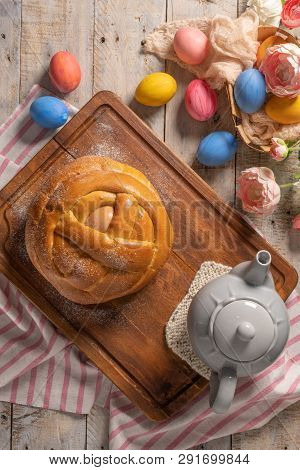 Portuguese Traditional Easter Cake. Folar With Eggs On Wooden Table