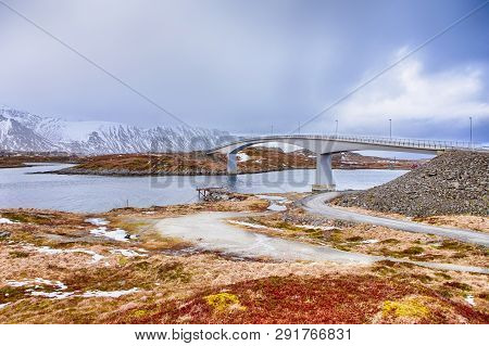 Travelling Ideas. Renowned And Unique Fredvang Bridges At Lofoten Islands In Winter Time In Norway. 