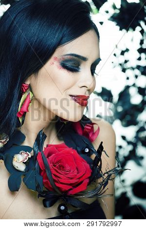 Pretty Brunette Woman With Rose Jewelry, Black And Red, Bright Make Up Kike A Vampire Closeup Red Li