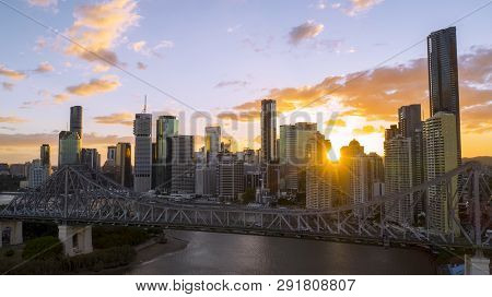 Brisbane, Australia - February 22 2019: Colourful Sunset Over Brisbane Cityscape With The Story Brid