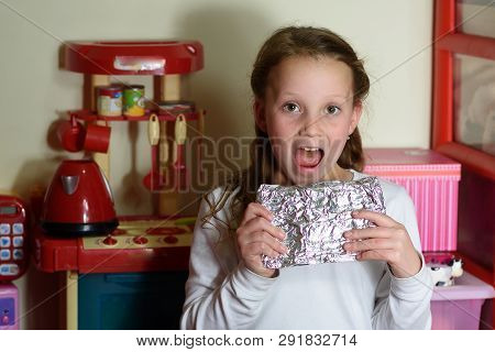 Girl Found It Afikoman Is A Half-piece Of Matzah Which Is Broken Of The Passover Seder.in Many Famil