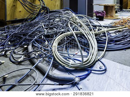 Cable Installation In The Server Room. Installation Of Equipment In A Modern Data Center, A Lot Of I