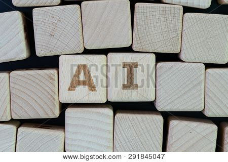 Ai, Artificial Intelligence Or Machine Learning In Future World Concept, Straggle Cube Wooden Blocks