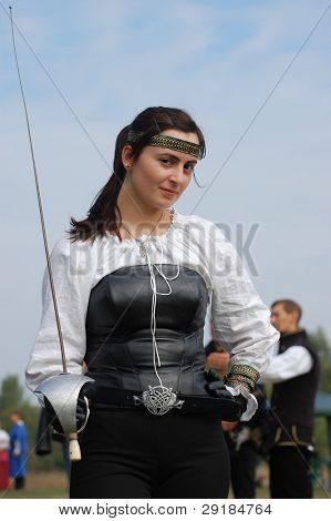 KIEV, UKRAINE - SEPT 19: Unidentified participant of Festivale of medieval costume wears historical costume Sep 19, 2010 in Kiev, Ukraine