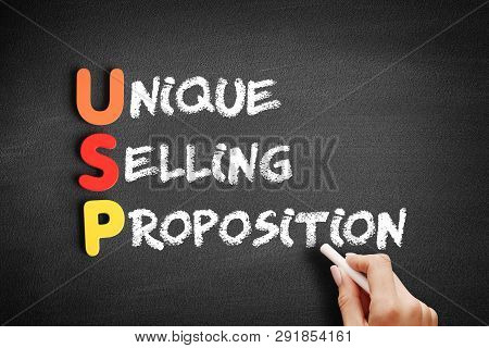Color Wooden Alphabets Building The Word Usp - Unique Selling Proposition Acronym On Blackboard