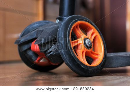 Orange Scooter Wheels, Three-wheeled Transport For Children
